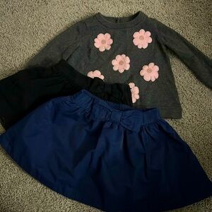 2 skirts and one sweater